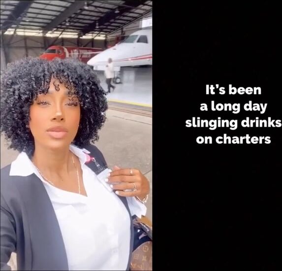 Flight attendant dances with big titties