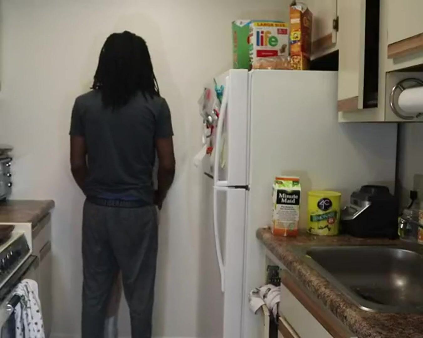 Amateur sex in a kitchen